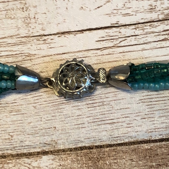 Handmade 7 strand beaded necklace in shades of green & white - Picture 9 of 10